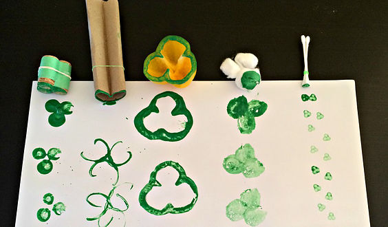 painting shamrocks with various household items