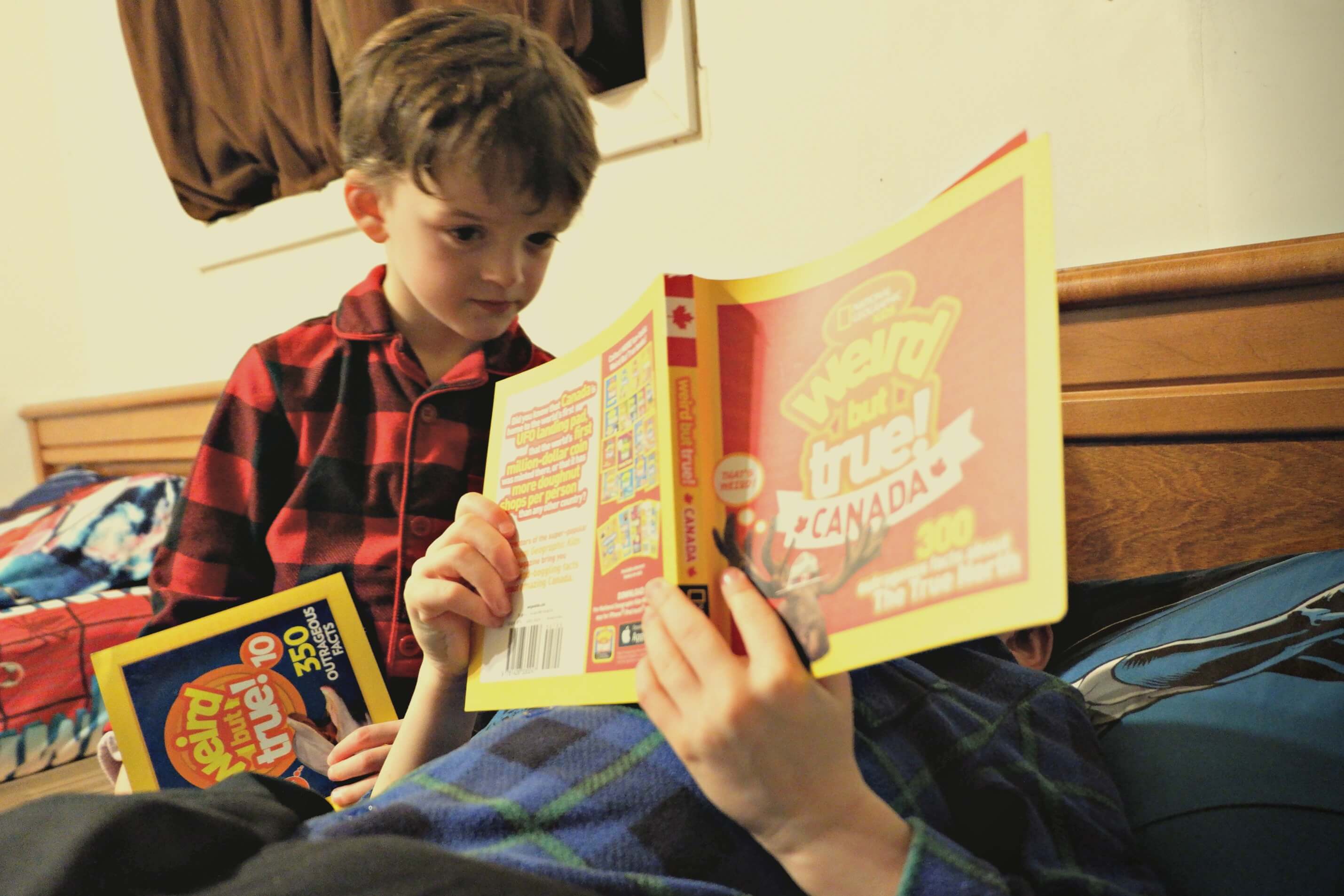 brothers reading together national geographic canada facts book weird but true bedtime reading brother kindergarten pickle planet