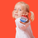 young girl holding voting button parents politics susan holt new brunswick leadership women