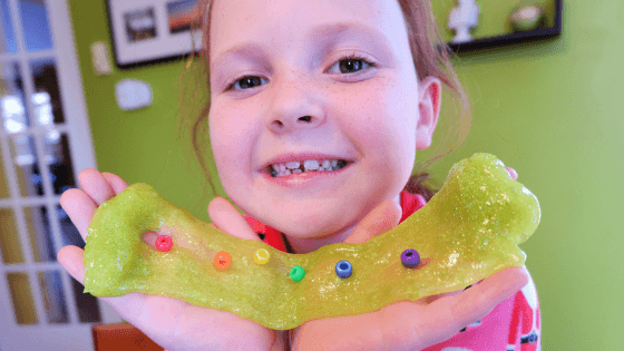 pickle planet smiling child with st. patrick's day slime no borax diy simple easy craft