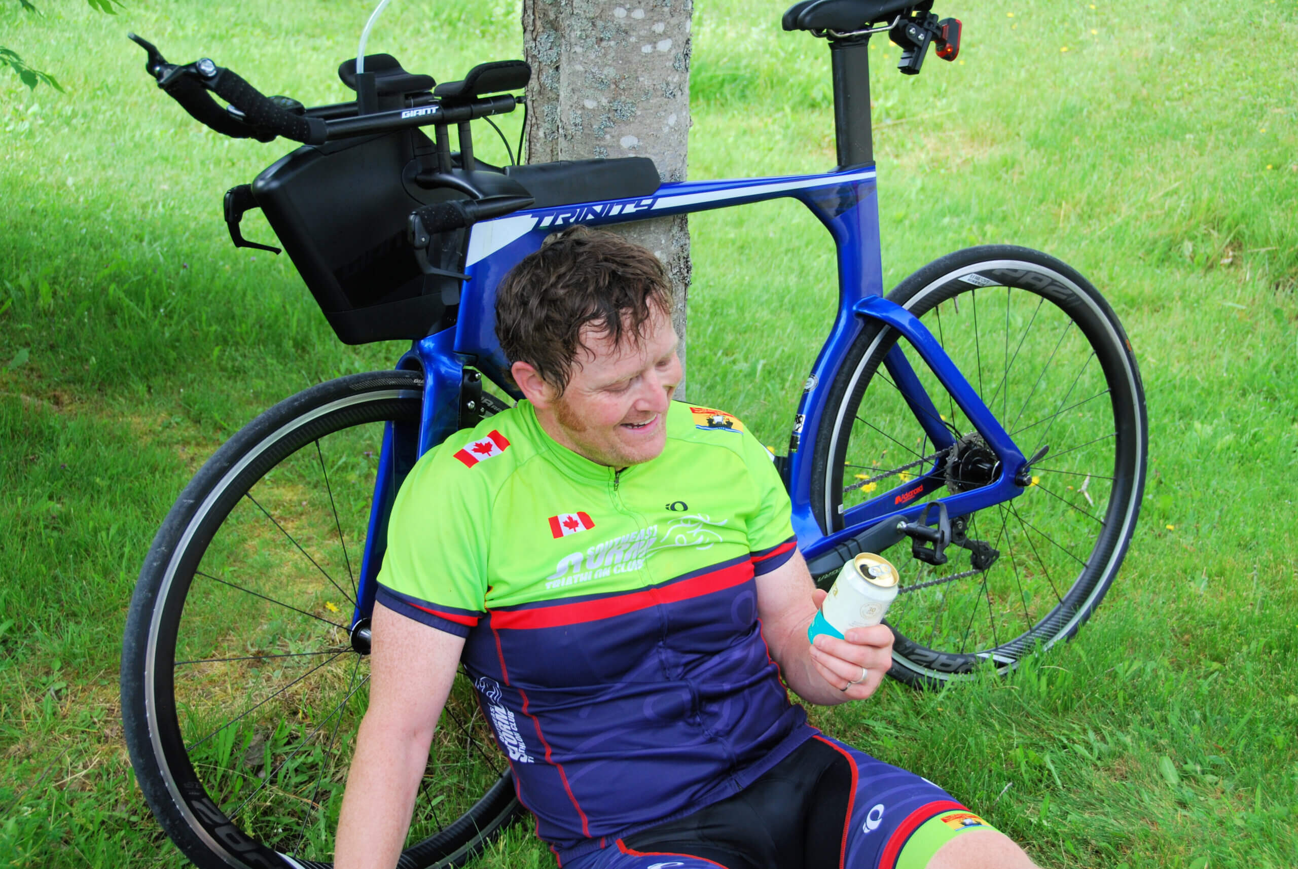 triathlon athlete resting with libra non-alcoholic beer